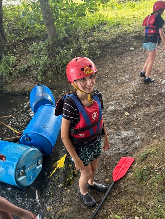 student with paddle