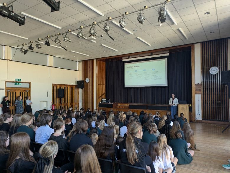 students sitting in hall