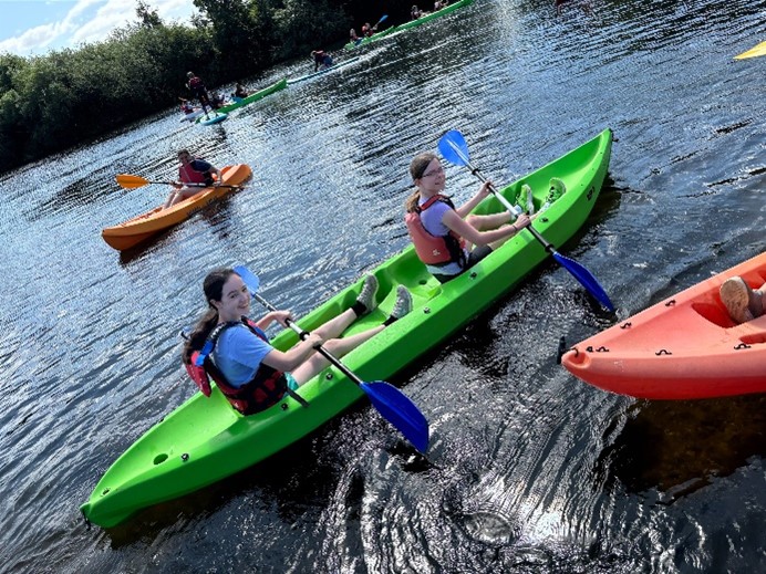 students kayaking