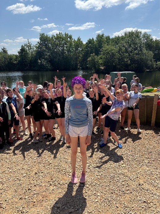 student wearing flowery swimming hat