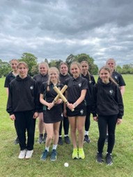 group of year 9 students with rounders bats