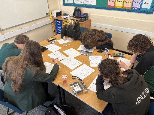 students doing maths questions whilst eating breakfast