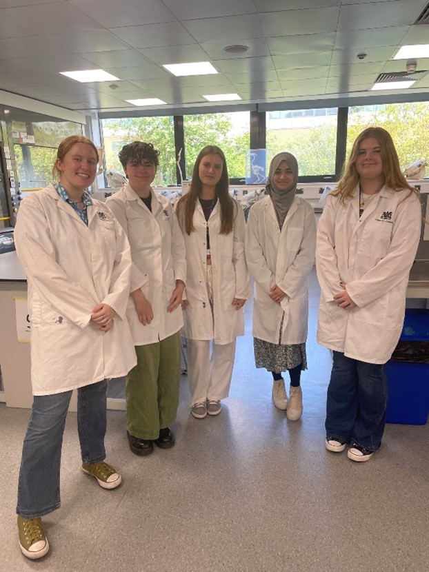 group of students in lab coats