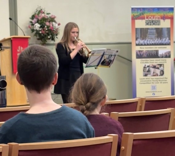 student playing trumpet