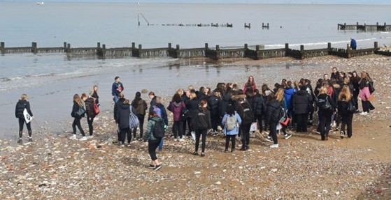 group of students on beach