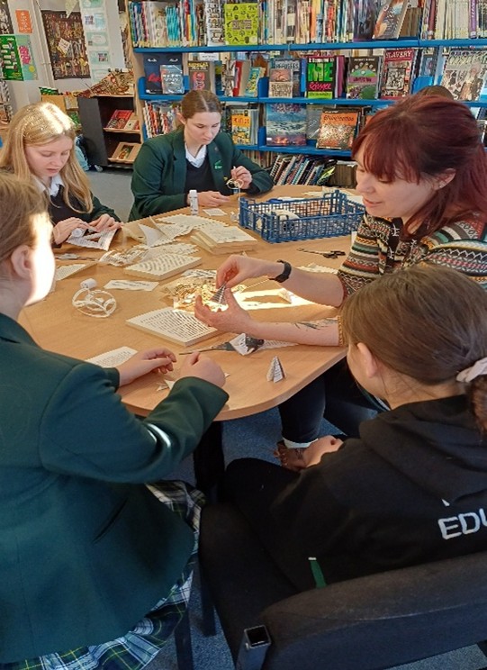 students doing origami
