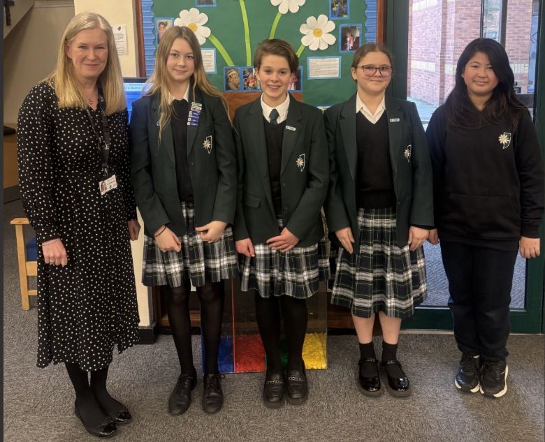 Year 8 students collecting awards