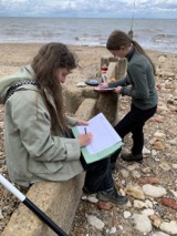 students on beach