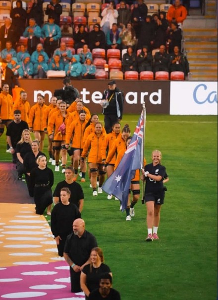 student carrying flag