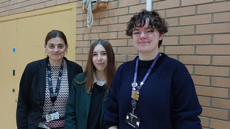 2 young carers with member of staff